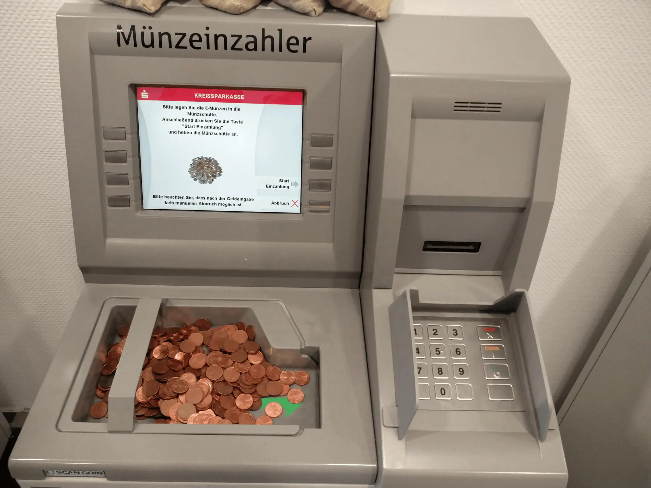 Bild eines Münzeinzahlungsgerätes